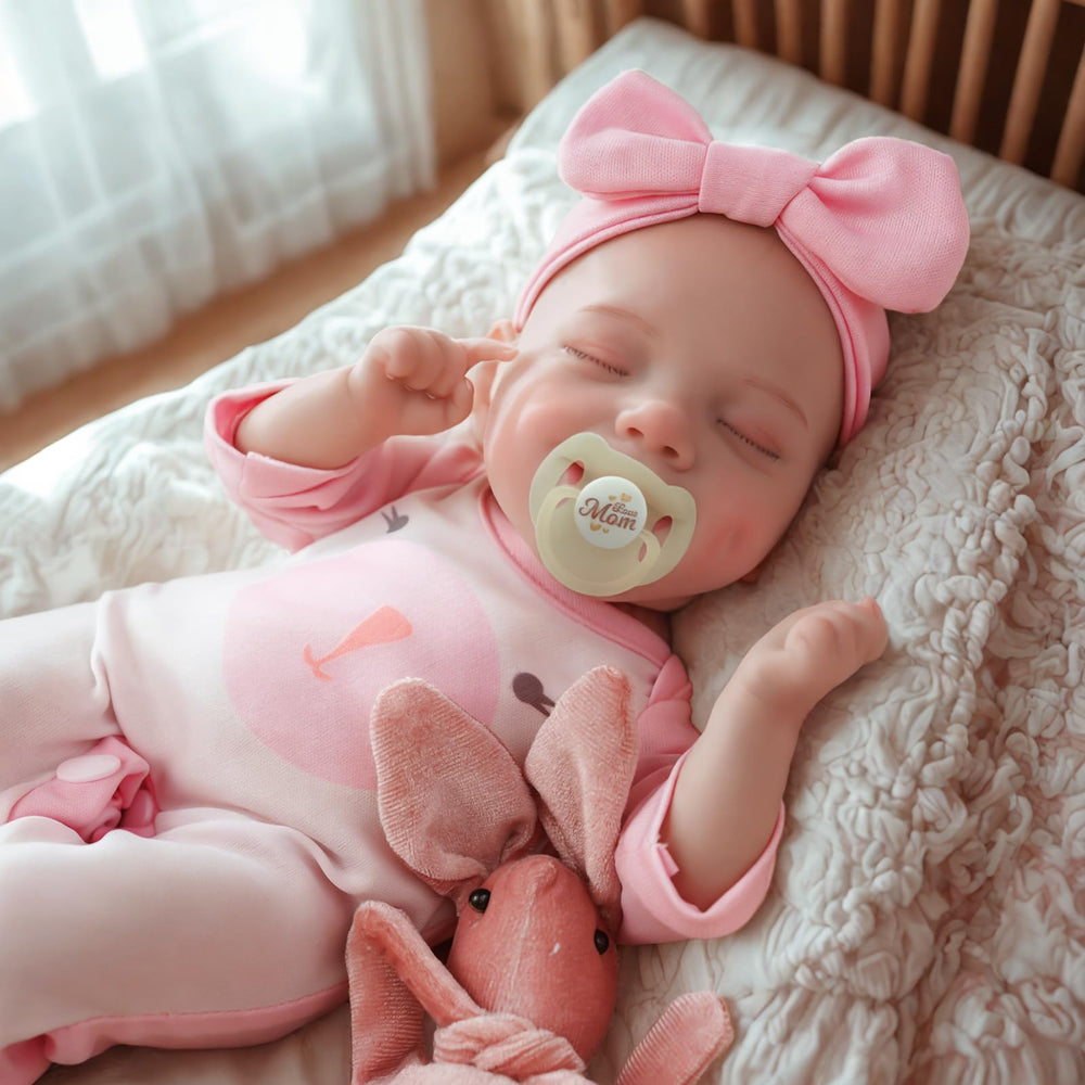 JIZHI reborn baby doll featuring hand-rooted lashes for a realistic look.