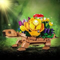 JMYZBD turtle planter flower back detail with vibrant blooms