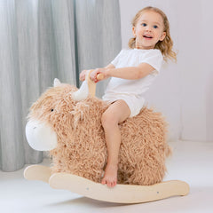 JOLIE VALLÉE TOYS wooden cow rocking horse for toddlers; inviting nursery play.