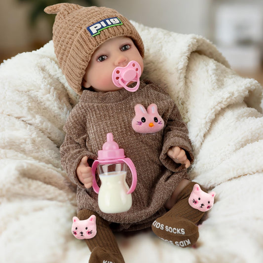 JONRRYIN Reborn doll face smiles, inviting interactive play.
