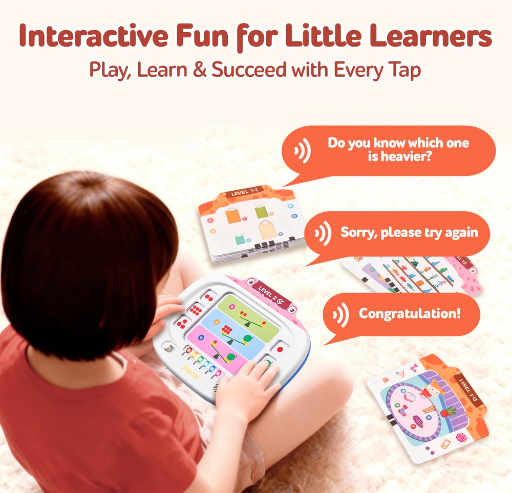 Kids learning at home with JoyCat tablet and flash cards.
