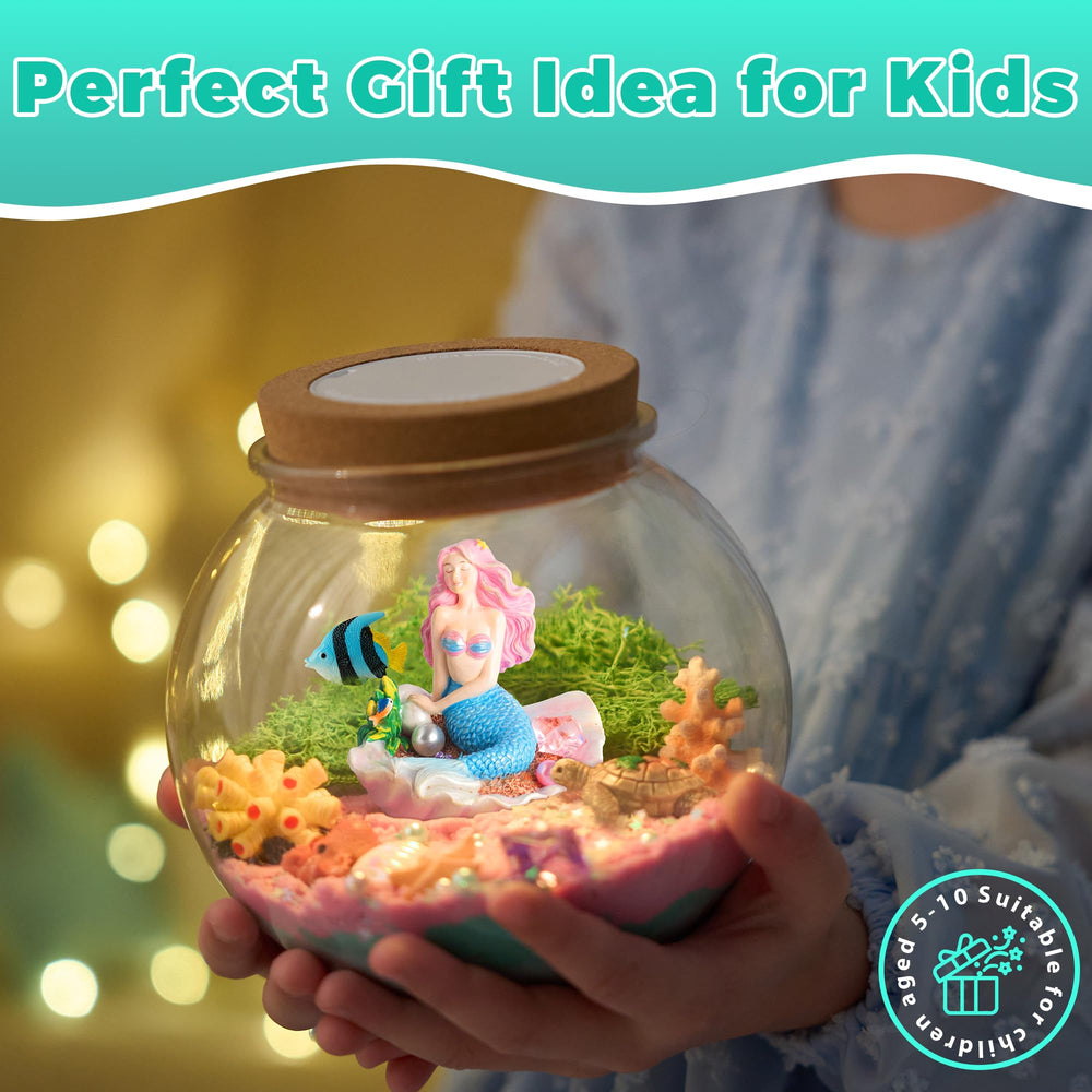 Included LED base casts a gentle glow across the terrarium scene