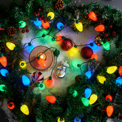 JOYIN packaging of the 12-pack Christmas LED necklaces.