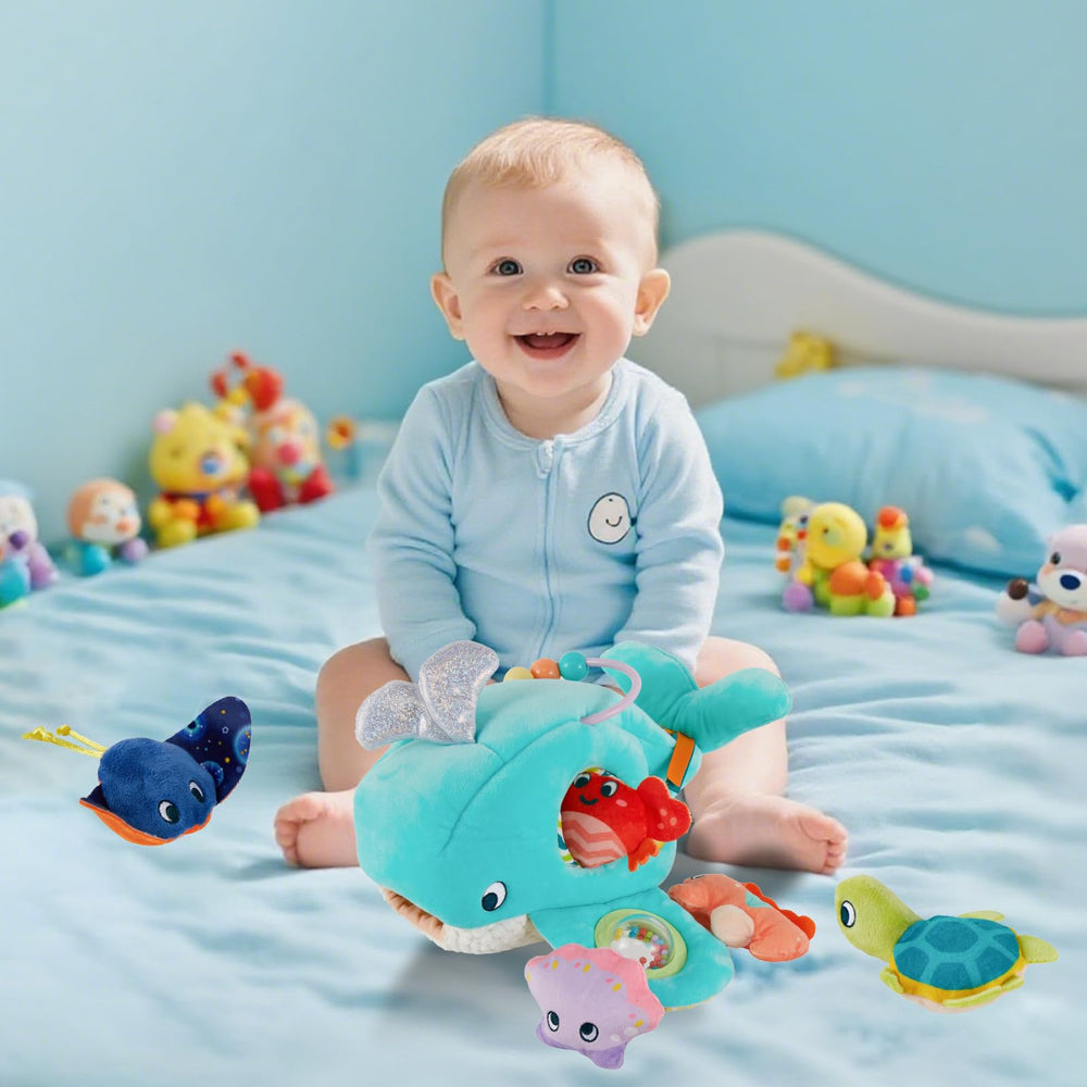 Juivin Ocean Whale hanging loops allow stroller or crib portability.