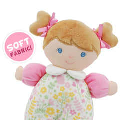 June Garden doll interior rattle provides gentle sensory stimulation during play.