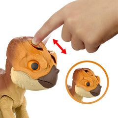 Jurassic World Aquilops Dolores tail-attack action triggers exciting pretend defense.