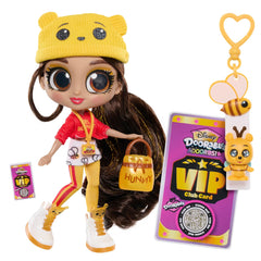 Just Play ADOORBS doll with attachable bag clip for display.