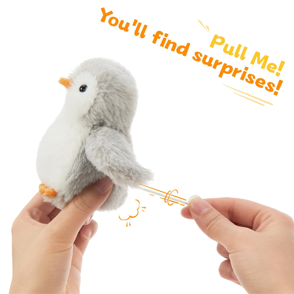 Karister wind-up penguin baby 2 for wobble fun during imaginative games.
