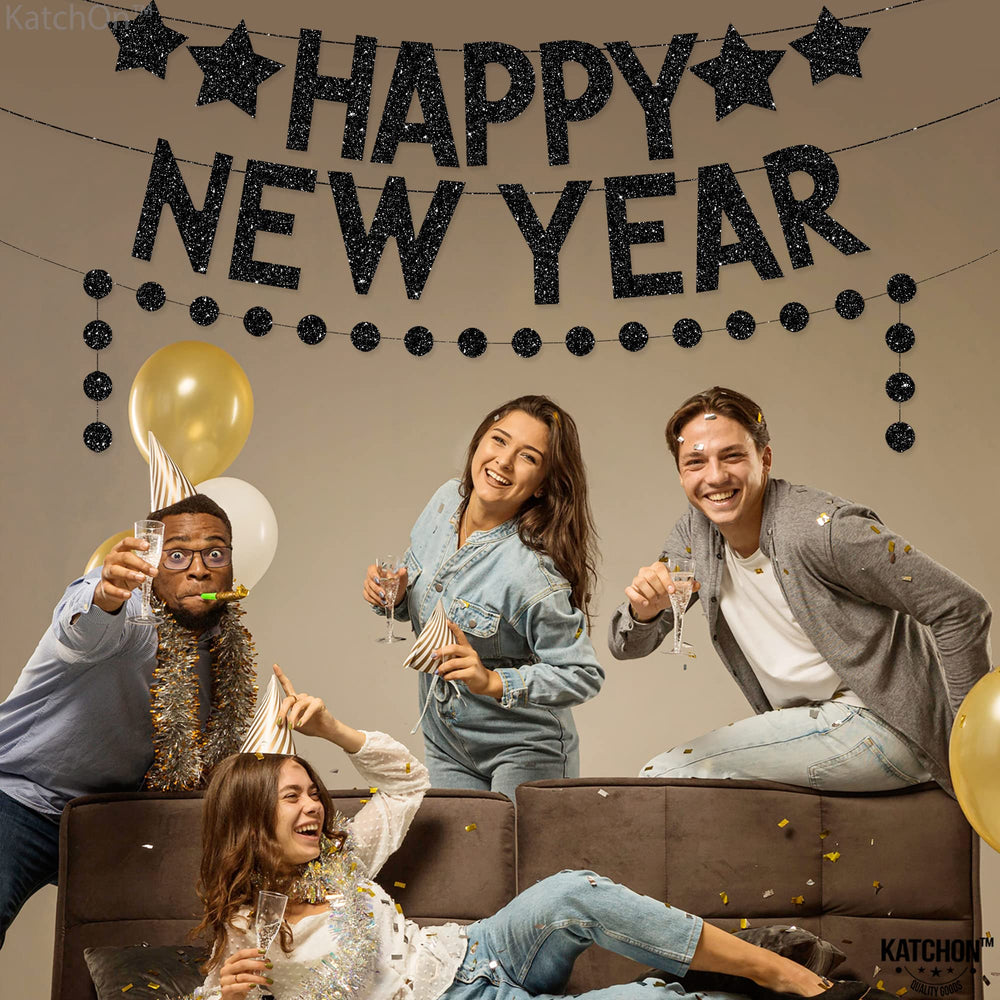 KatchOn black glitter new year banner creates a dramatic backdrop for NYE parties