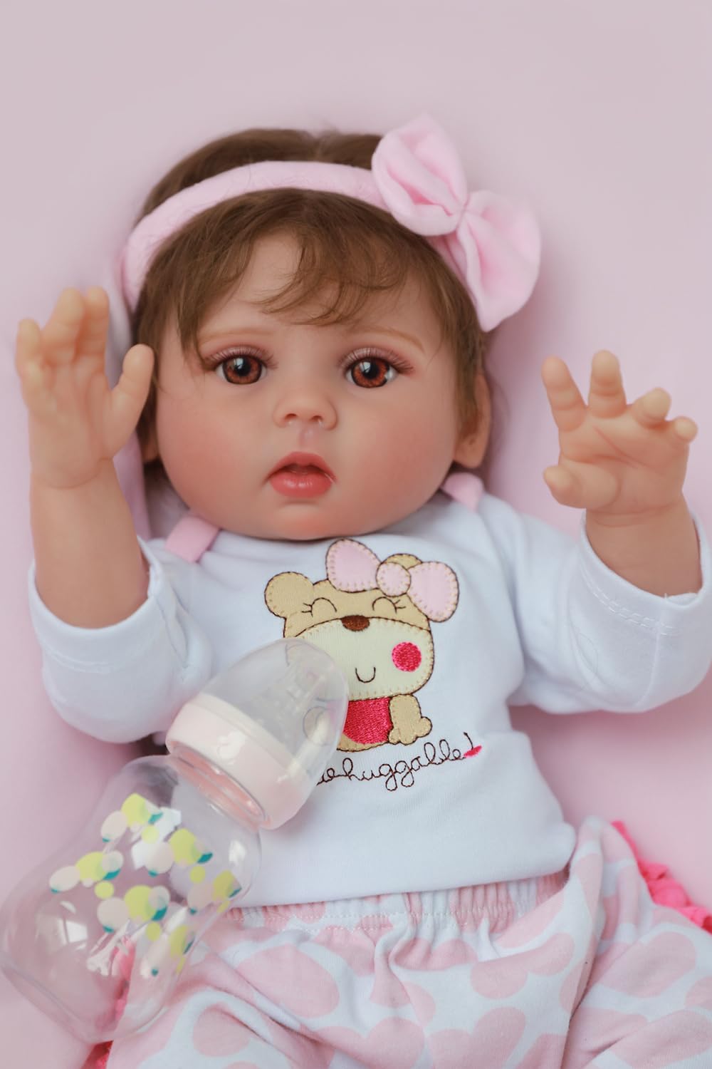 Kaydora magnetic pacifier and feeding bottle for engaging baby rituals.