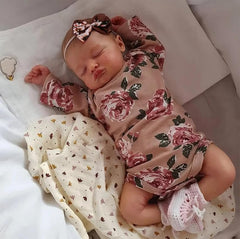 Kaydora Reborn hands and feet feel authentic for nurturing play.