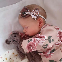 Kaydora Reborn doll veins close-up highlights realism.