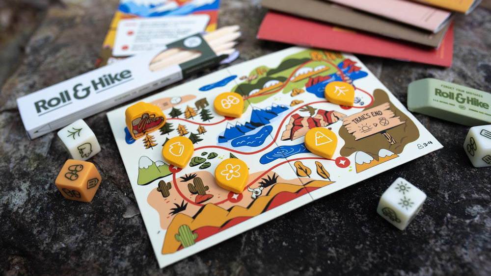 Keymaster Games Parks Roll and Hike pencil box with deluxe eraser for notes.