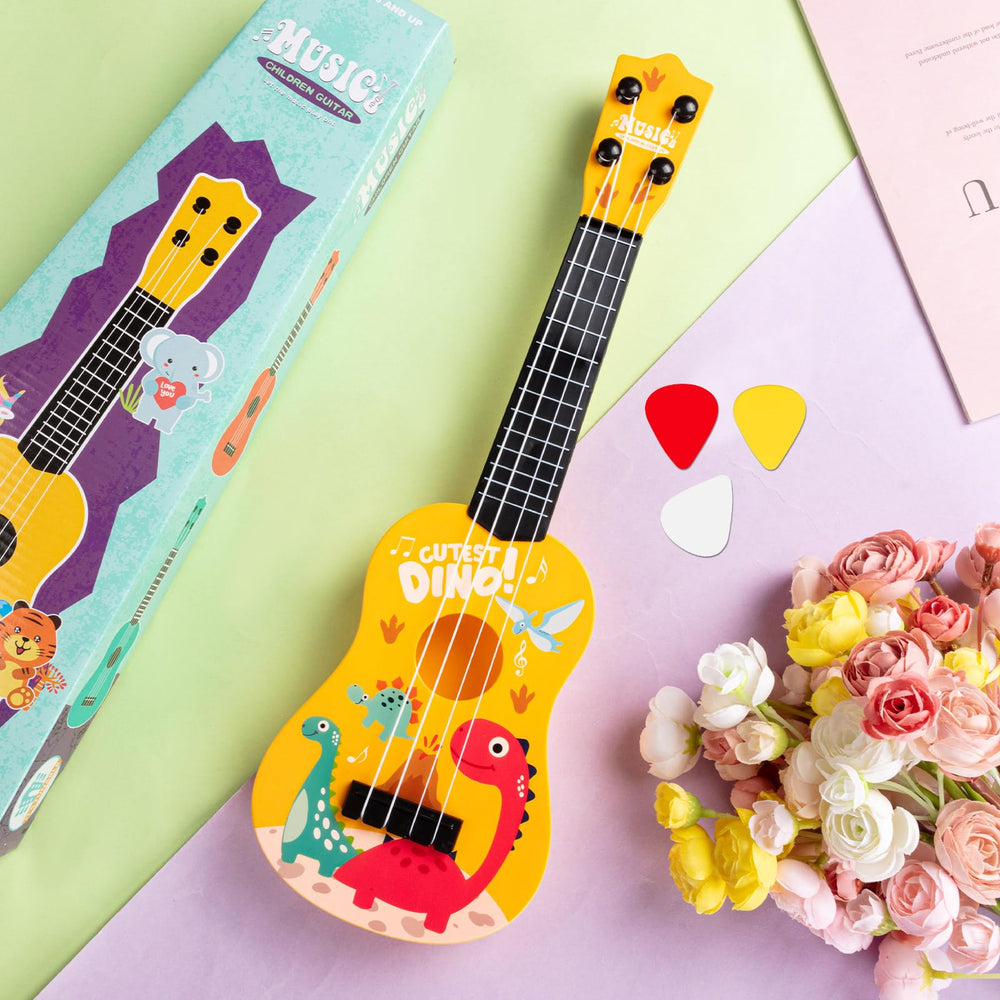 KFPPLXQ mini guitar 17inch dinosaur gift pack ideal for birthdays.