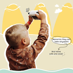 Kidamento instant print camera printing action with a photo emerging from the device.