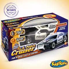 Kidirace RC police car with non-slip wheels for stable play on smooth floors.