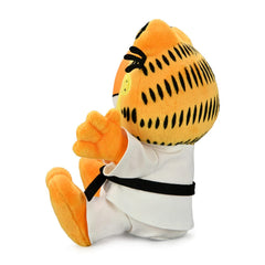 Kidrobot Garfield karate gi plush, face detail close-up, captures iconic expression.