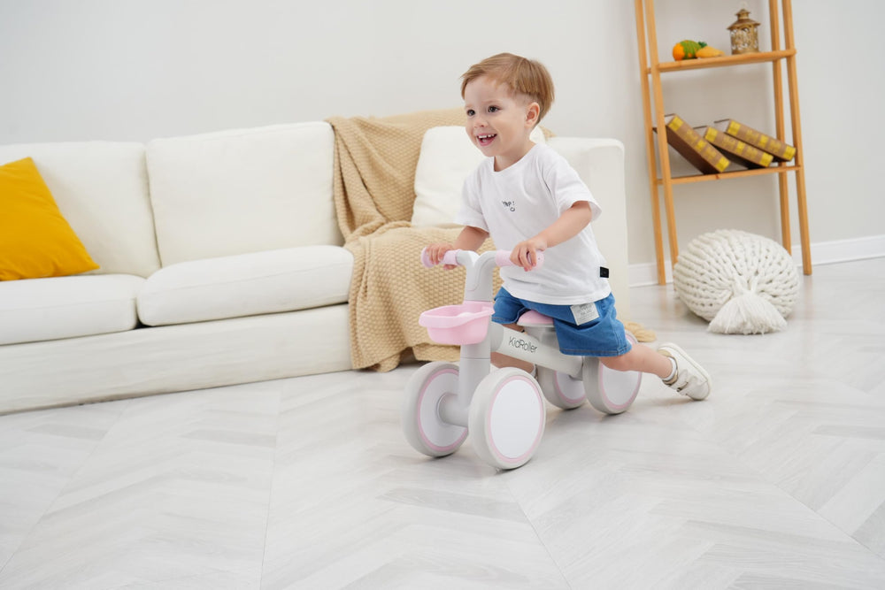 Pink KidRoller balance bike with soft-grip handles for secure steering.