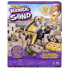 Kinetic Sand Dig N' Demolish front-loader truck shaping sand for construction play.