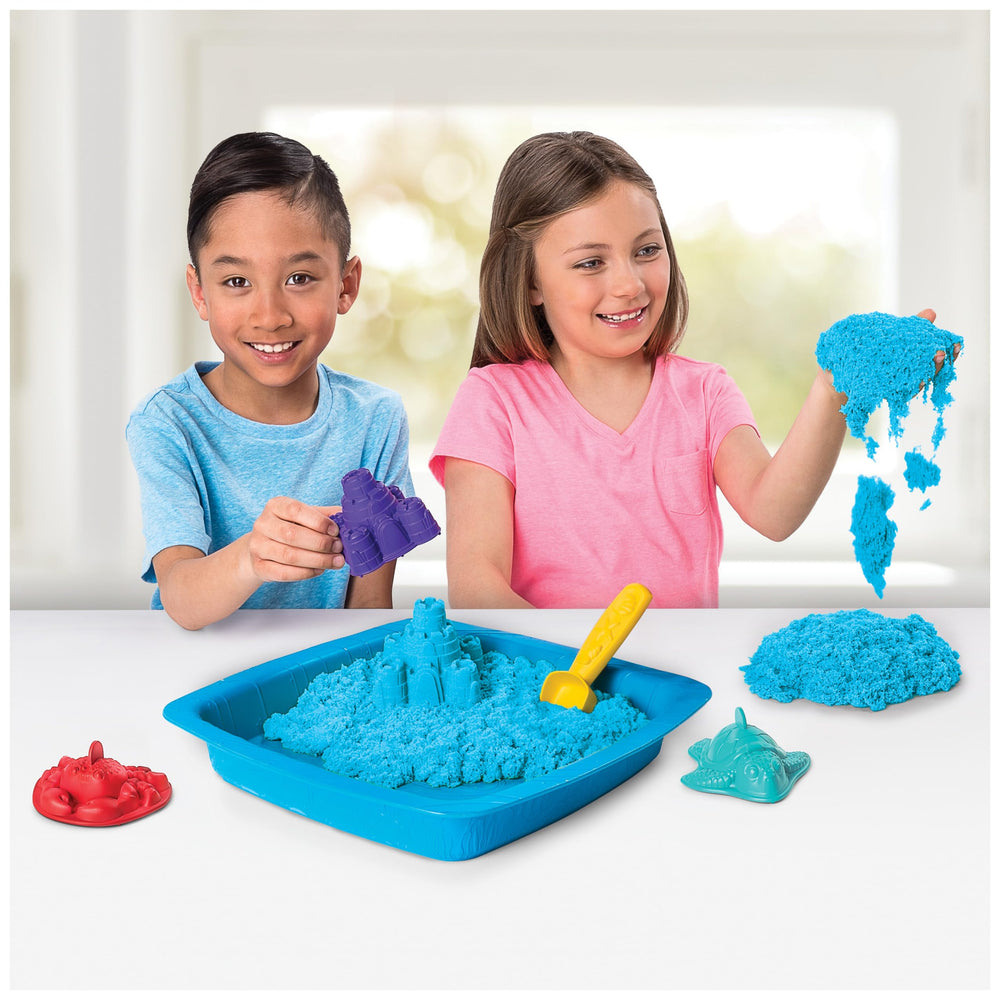 Kinetic Sand molds turtles for imaginative play and shaping.