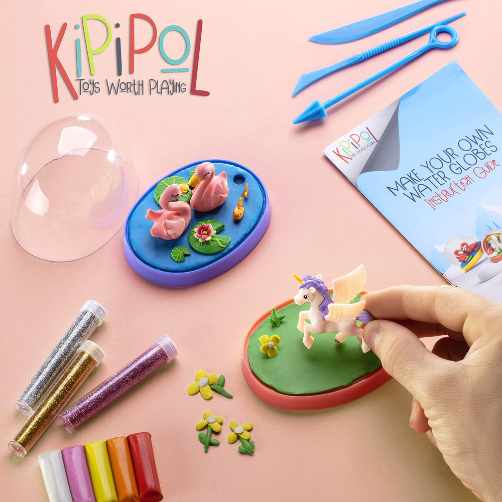 Kipipol glitter bottles add sparkle to kid-made globes.
