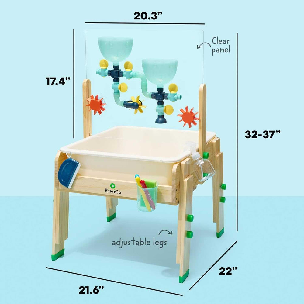 KiwiCo water and sand sensory table sensory-bin demonstrates dump and scoop play for fine motor skills.