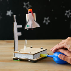 KiwiCo Astronaut Starter Kit pumps powered ships demonstrate propulsion in a playful setup.