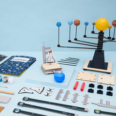 KiwiCo Astronaut Starter Kit spinning solar system helps visualize orbits and gravity concepts.