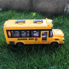 KNACKTOYZ RC School Bus showing bright LED headlights for night play.