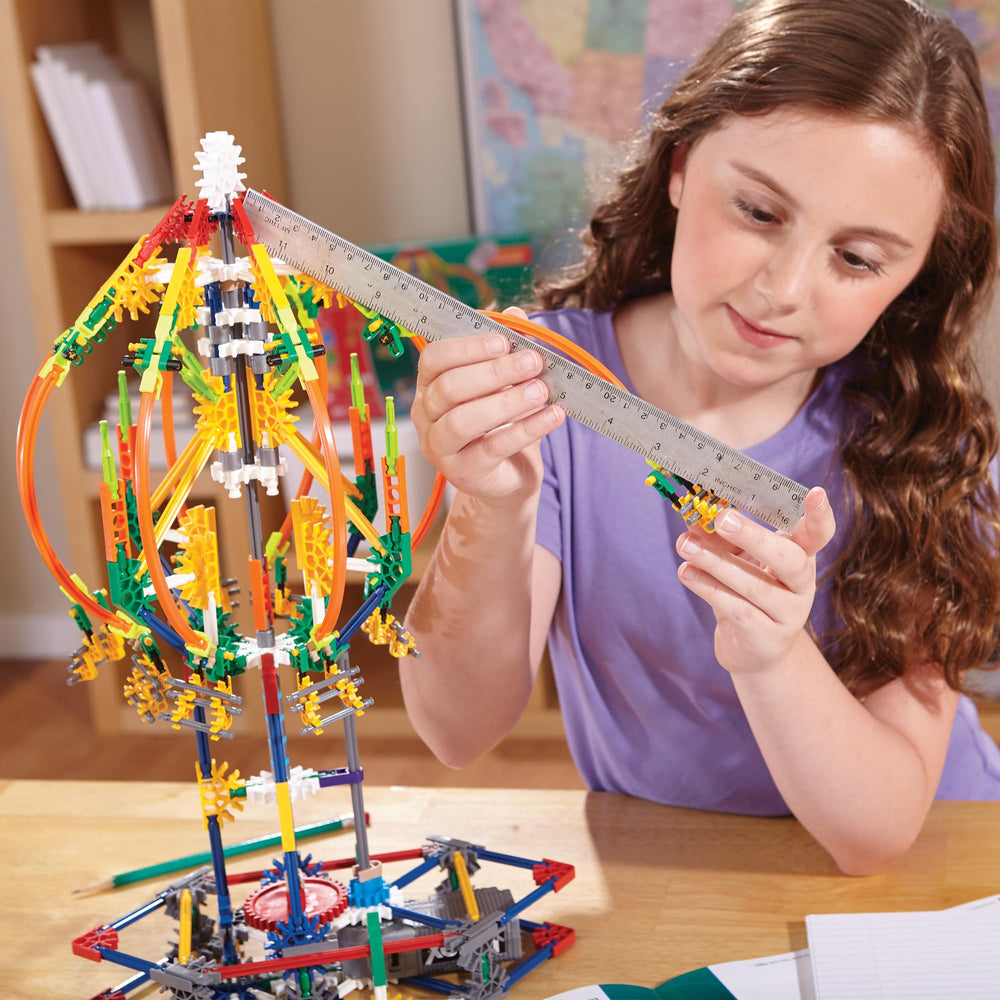 K'NEX motor-powered action shows a functioning ride powered by two AA batteries.