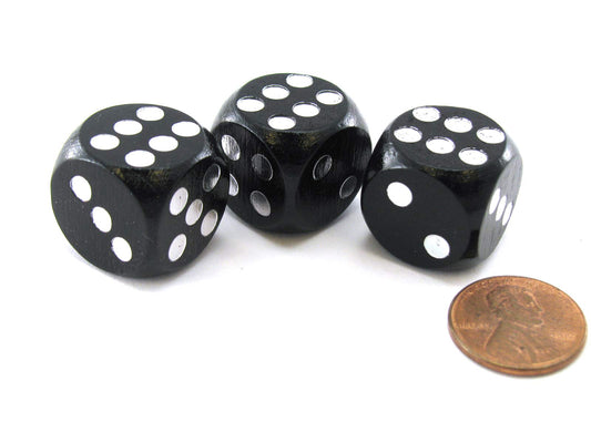 Koplow Games character builder loaded dice appearance, black dice with silver pips for dramatic RPG visuals.