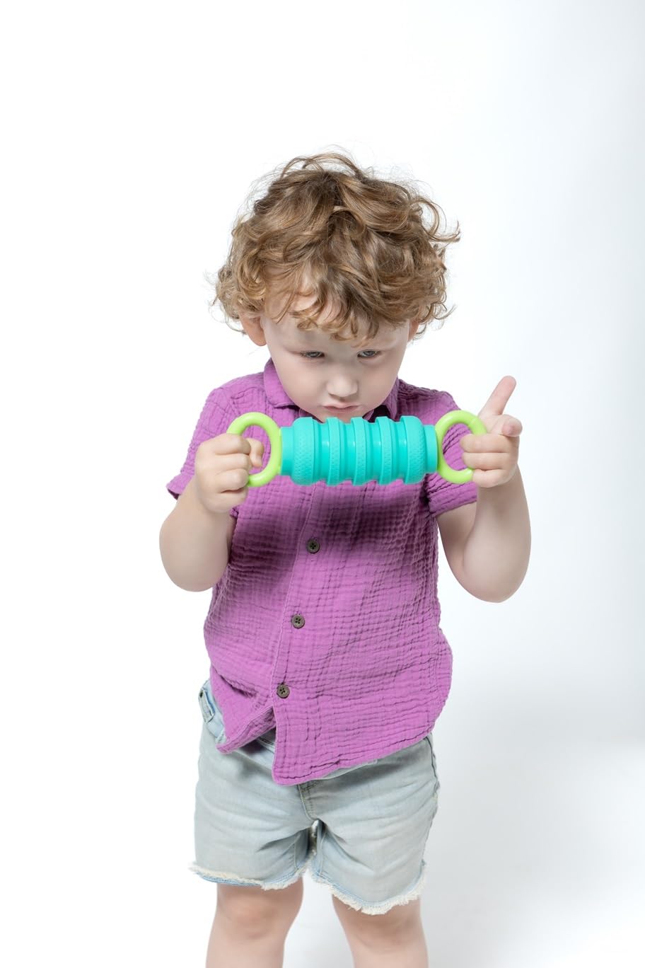 KRUMPLES Pully Teal in-hand demonstrates easy grip for tiny fingers.