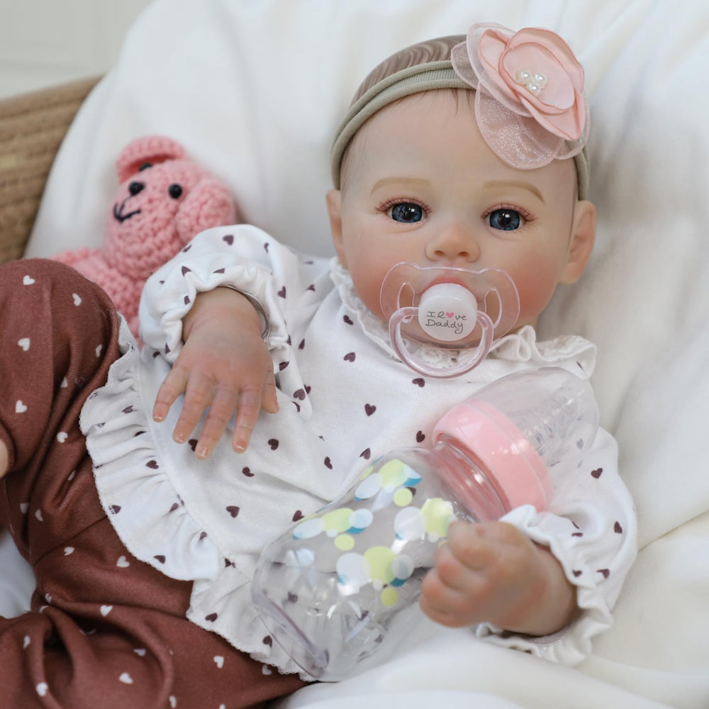 KSBD Reborn doll featuring interchangeable outfits for endless creative styling and pretend dressing.