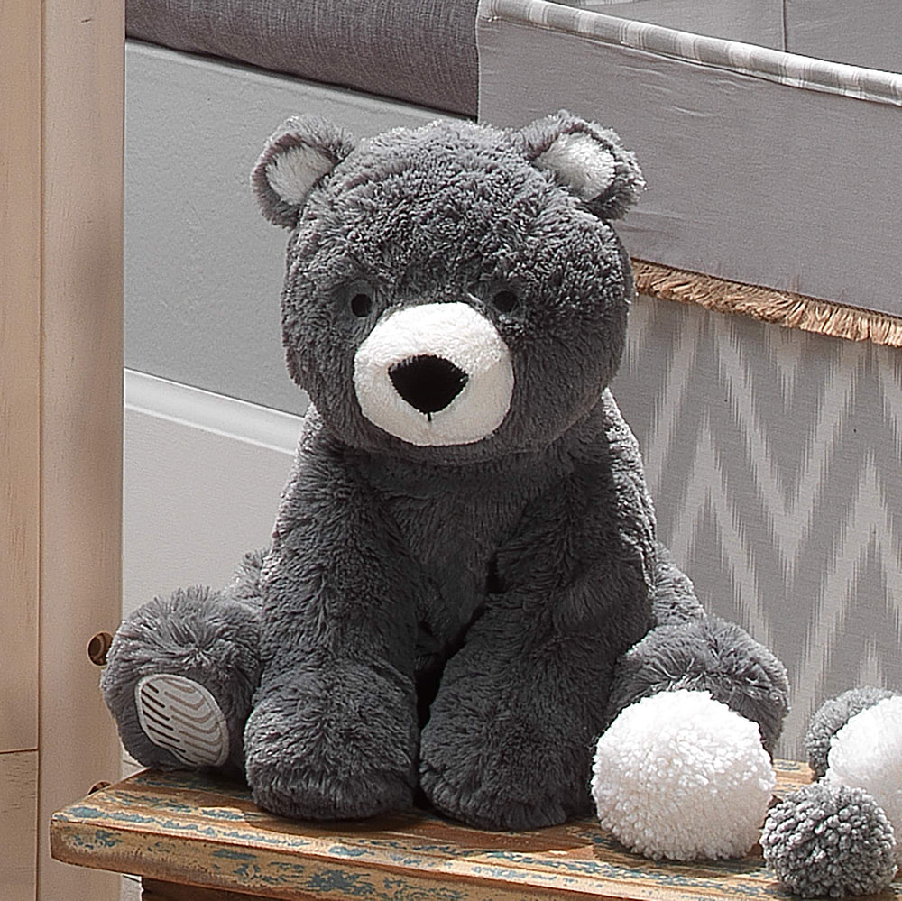 Lambs & Ivy Oscar bear back view reveals soft charcoal fur.