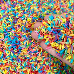 Lattooland Rainbow Rice bin assembly shows vibrant sensory setup for kids