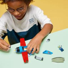 LEGO City stunt plane with minifigure pilot and detailed vehicle features.