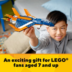 LEGO Creator 3in1 play scene featuring jet, helicopter, and boat for imaginative action