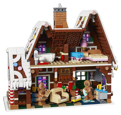LEGO Gingerbread House interior bedroom features chocolate bed and cotton candy lamp.