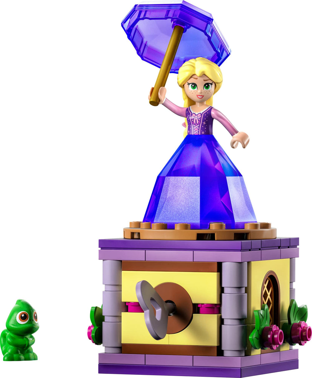 Diamond dress doubles as a storage solution for the mini-doll and umbrella.