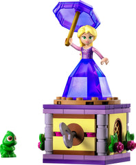 Diamond dress doubles as a storage solution for the mini-doll and umbrella.