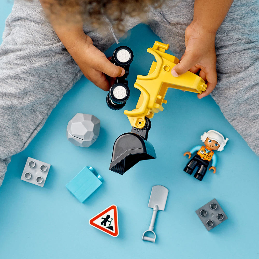 LEGO DUPLO construction worker with hi-visibility vest sparks role play