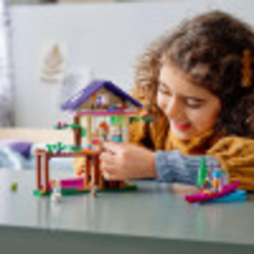 LEGO Friends Forest House interior bedroom scene for cozy pretend living.