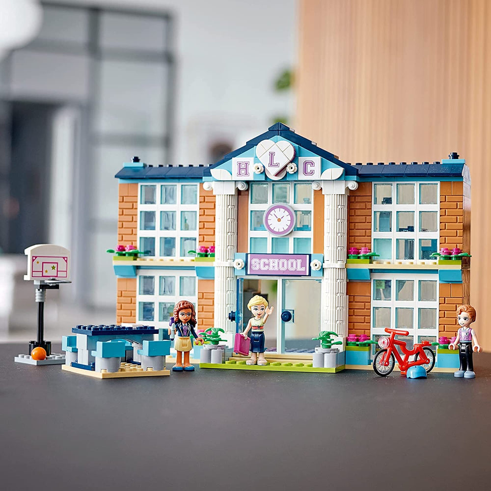 LEGO Friends Heartlake City School figures set includes teacher and three mini-dolls.
