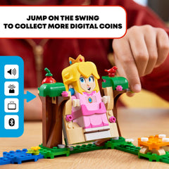 Lemmy figure stands on a buildable tower for action-packed challenges.