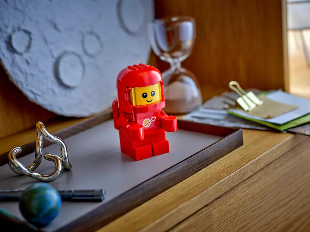 LEGO Up-Scaled Baby Astronaut 40767 display piece enhances home or office with whimsy.