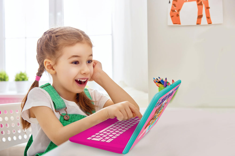 Lexibook Paw Patrol laptop gameplay showing Snake, Memory, and Puzzle games
