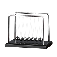 LICRAFT Newton's Cradle with seven balls on a wooden base for elegant desk decor.