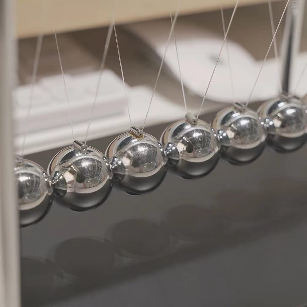 LICRAFT Newton's Cradle serves as a teaching aid for hands-on demonstrations.
