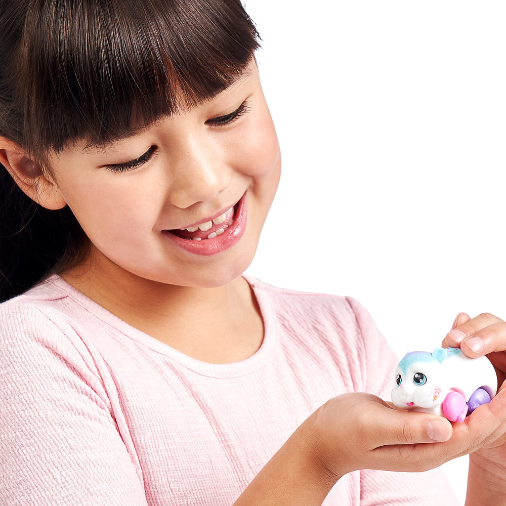 Little Live Pets Sprinkz reacts to petting with lively sounds.