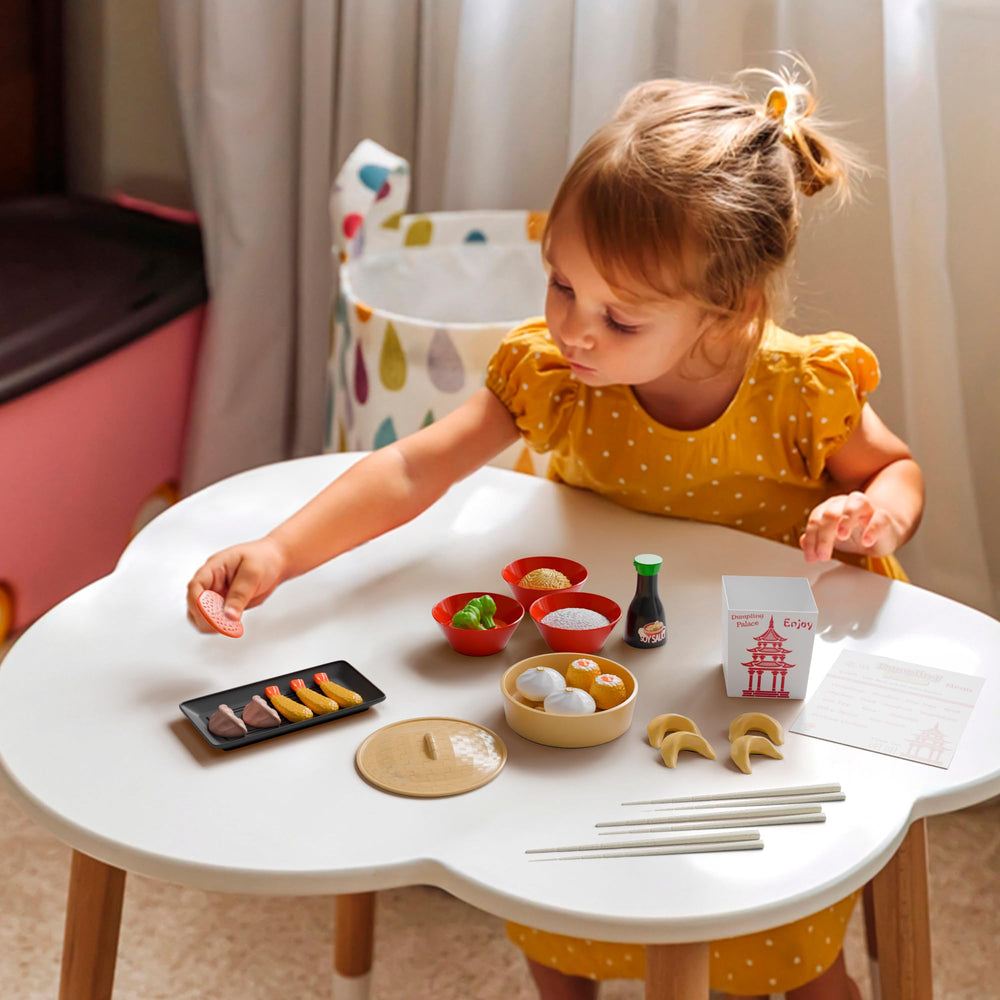 Lollipop Dumpling Palace plates and bowls provide colorful dining setup for sharing stories